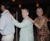 NFB members dancing in a conga line at their state convention.