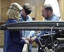 shop teacher in rehabilitation setting showing blind students non-visual techniques