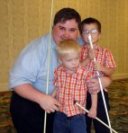 blind father with his blind twin sons