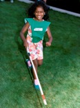 Girl running with cane