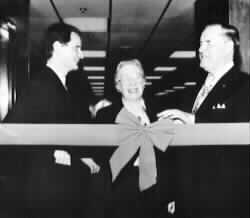 Picture of Dr. Maurer and Dr. Jernigan cutting the ribbon at the opening of the IBTC.
