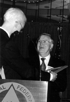 Michael Gosse presents the Louis Braille Memorial Award to Michael Tobin.