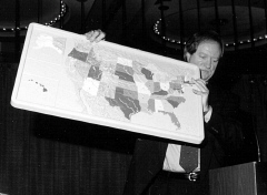 Marvin Sandler demonstrates the Odyssey Talking Tactile Globe to Tim Cranmer and another Federationist.
