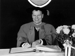 Paul Gabias in academic regalia receives an honorary doctorate.