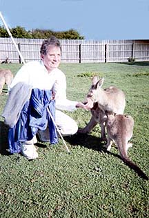 Dr. Maurer feeding kangaroos.