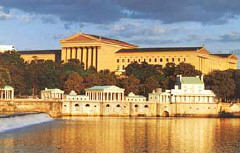 The Philadelphia Museum of Art with the old Fairmount Water Works in the foreground on the Schuiykill River.