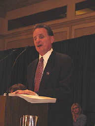 Dr Maurer delivers his presidential report.