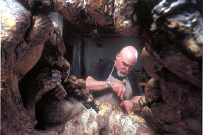 Steve Handschu at work carving one of his sculptures.
