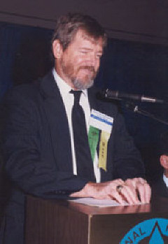 Jerry Whittle speaking from Braille notes.