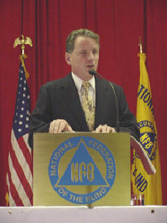 Dr. Marc Maurer delivers the 2002 presidential report.