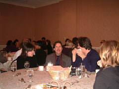 Priscilla McKinley and Brian Miller of Iowa and Jerry Darnell of Louisiana enjoy the student banquet.