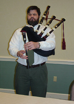 Craig Hedgecock, a Federationist from Troy, New York, plays "Scotland the Brave" on his bagpipes at the opening meeting of the 2004 Washington Seminar
