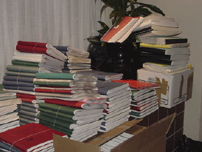 A stack of Braille books waits to be displayed during the Braille flea market.