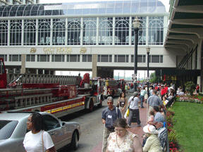 People poured out of both towers of the Galt House when the fire alarms sounded.   Soon fire engines appeared.   Part of the renovated and expanded bridge between the towers, where the smoke detector malfunctioned, can be seen here.