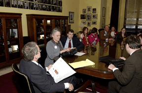 Seated at the head of the table in his conference room, Senator Mike DeWine talks with members of the Ohio delegation. Affiliate president Barbara Pierce is on his left.