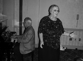 Marilyn Donehey entertains party-goers at the NFB of Ohio convention.