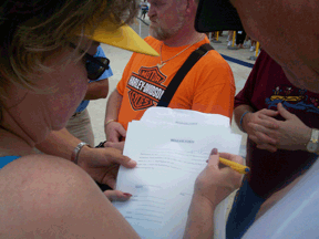 Bridget Worley signs the waiver.