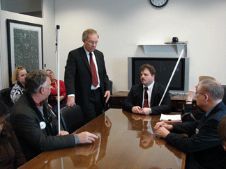 NFB of Colorado President Scott LaBarre (center) seated at the head of the table, and members of the Colorado delegation talk with Senator Wayne Allard in his office.