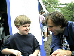 Erik meets blind children at events all over the country and encourages them to pursue their dreams.   Here he talks to John  Vickers of Texas at a National Library of Congress book fair.