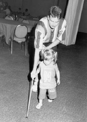 Mark McClain and Macy with her first cane.