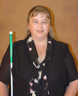 With good cane travel skills, Federationist Merry-Noel Chamberlain is always prepared to tackle new endeavors, either on the ground or in the air.