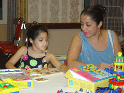 Maria Garcia with her daughter, Elora, at the convention in Louisville.