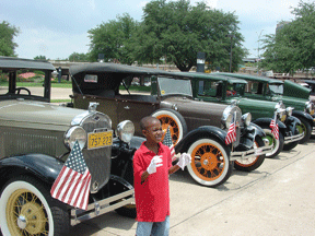 Kishawn Hoover (TN) at the 2006 car show sponsored by the NFB CARs division. The NOPBC will collaborate with the CARs division to put on a special kid-friendly �What You Auto Know� event at the 2007 convention.