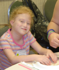 Lindsay Shapiro, daughter of Marlene Shapiro, works on a craft project at the Art with Feeling session.
