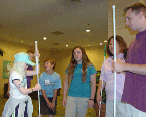 A group of kids prepare for their next skit.