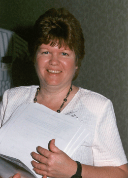 Sandy Taboada manages the NOPBC registration at the 1999 convention.