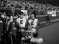 Michael Conlon and teacher, Sheila Amato, in band uniforms and ready to march.