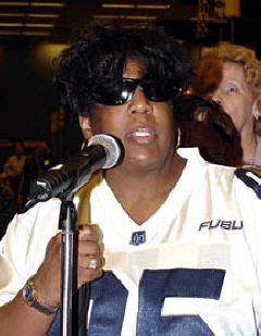 Venona Thomas, President of the NFB of Alaska, gives the report for her delegation during the 2002 roll call of states.
