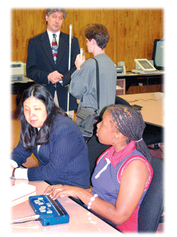 Students working with Braille computers