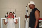A menter and mentee workout together.