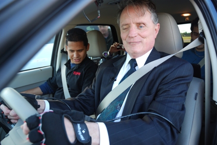 Dr. Maurer driving the Ford Escape equipped with nonvisual interface technology.