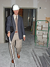 A man walks through a construction site