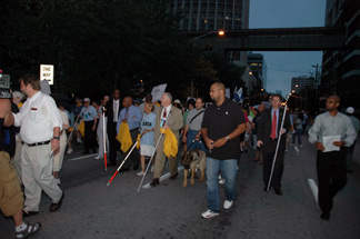 The 2007 March for Independence began just as dawn was breaking on July 3. The marchers can be seen here with the skyline of Atlanta behind them.