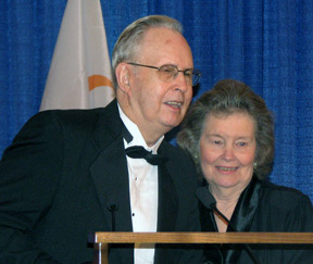 After being honored at the banquet, Don and Betty Capps came to the microphone to offer thanks. Here, Don is speaking with Betty beside him.