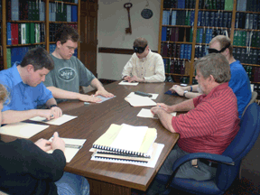 Jerry Whittle (right) instructs five students in the efficient use of the slate and stylus.