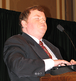 Jonathan Mosen addresses the convention, reading his text directly from the PAC Mate Omni.