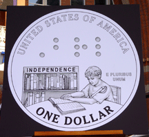 The reverse of the Louis Braille Bicentennial Silver Dollar