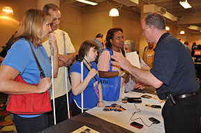 Exhibit Hall shoppers flocked to the GW Micro table to get their hands on the new BookSense.