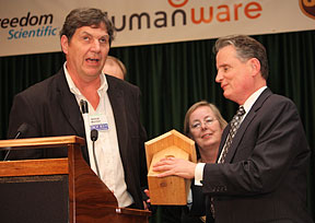 George Wurtzel presents a bluebird house to President Maurer.