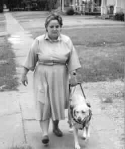 Photo of Gigi Firth with
her dog.