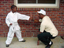 Anil and Amari practicing Karate