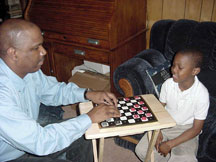 Anil and Amari play checkers