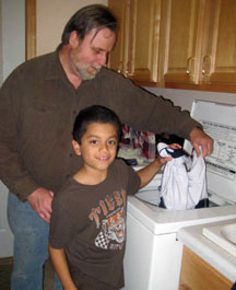 It's never to early to learn to do laundry.