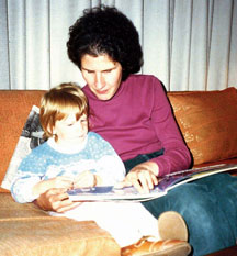 Debbie reads to her daughter
