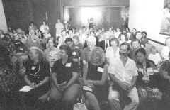 Photo of the crowd listening.(21191 bytes)