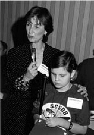 Dr. Sheila Breittweiser, President of the South Carolina School for the Deaf and the Blind accepts the $200 cash award for Outstanding Participation in the 2000 Braille Readersare Leaders Conmtest.  With her is Anna Miller, a student at the school and the daughter of NOPBC board member, Sally Miller